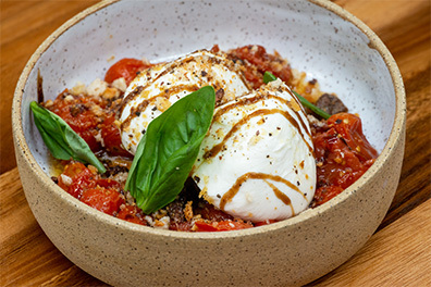 Burrata appetizer prepared at our Pasta Restaurant near Cherry Hill.